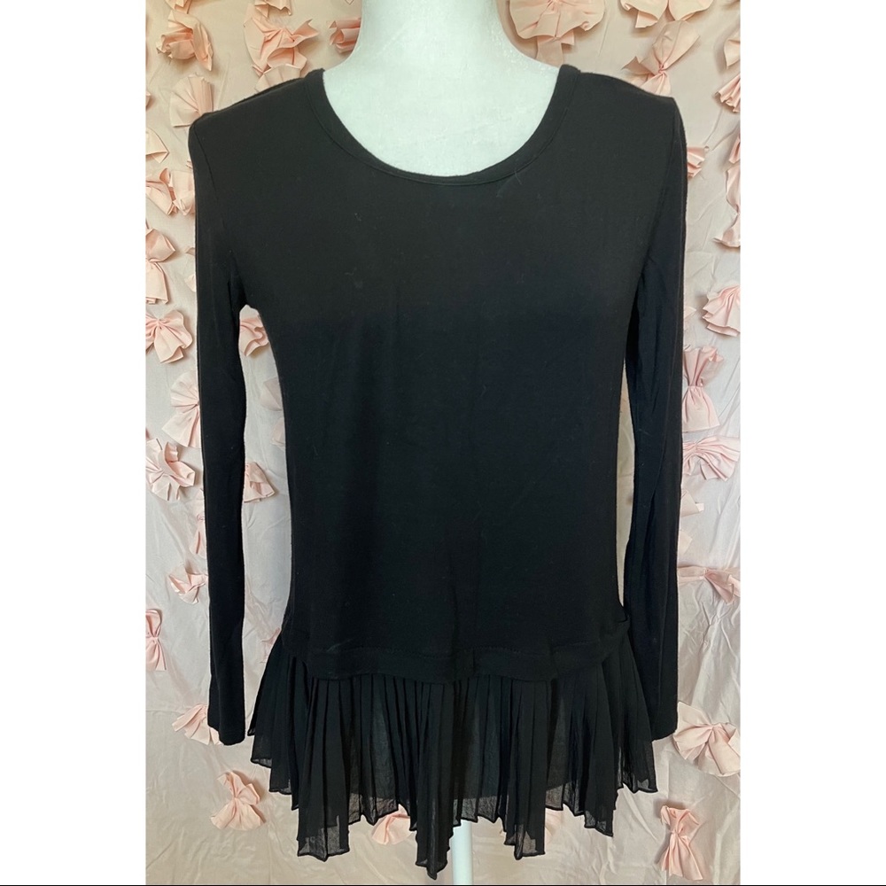 Black top, flirty on the bottoms.